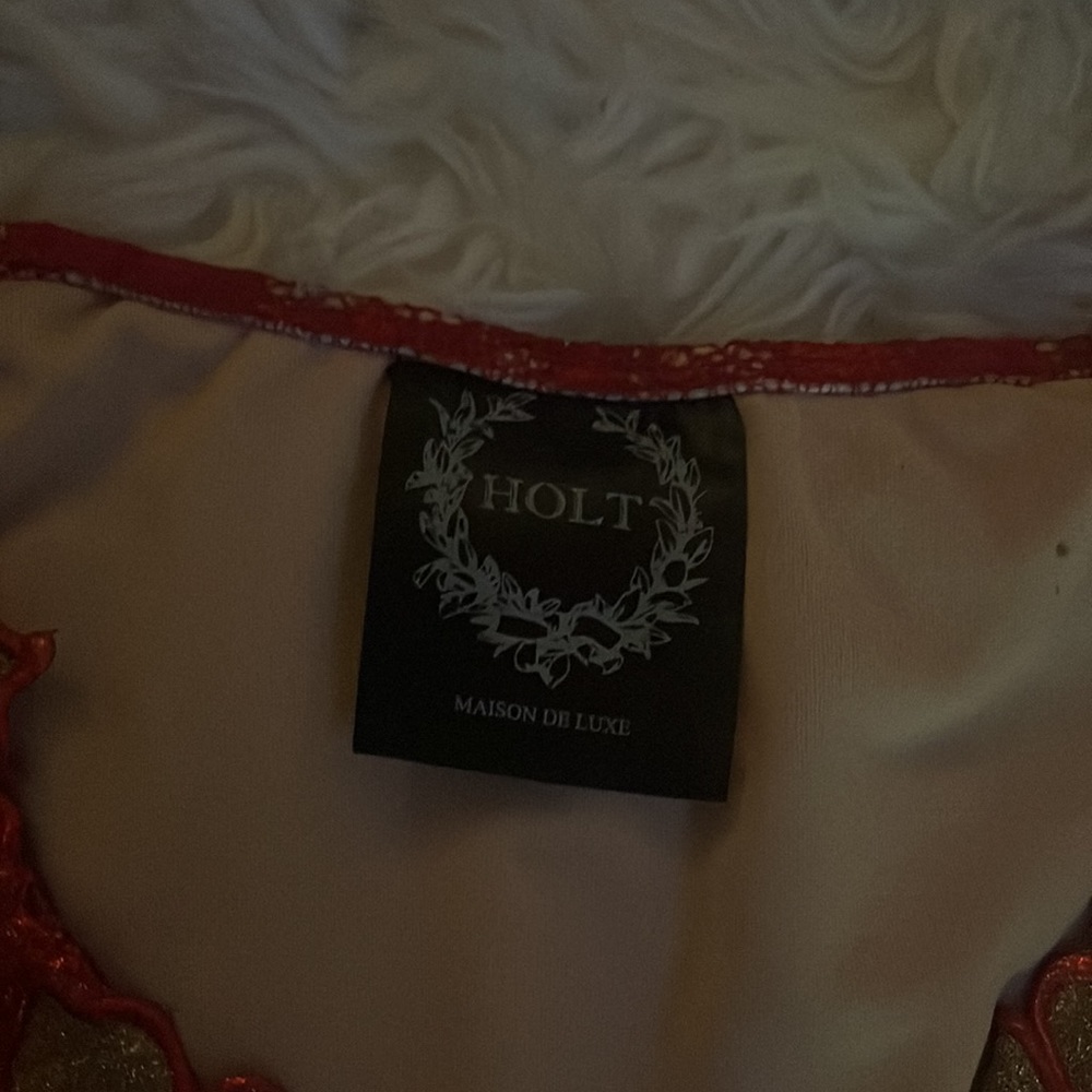 Holt Miami top (runs a little small) and gives great cleavage!! - Picture 5 of 5